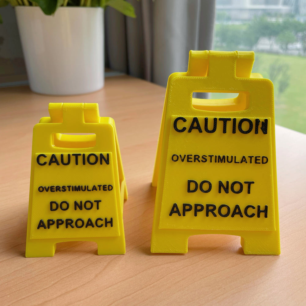 Caution Overstimulated Sign for Desk - Yellow Sign with Black Text, Warning Message for Safety Awareness
