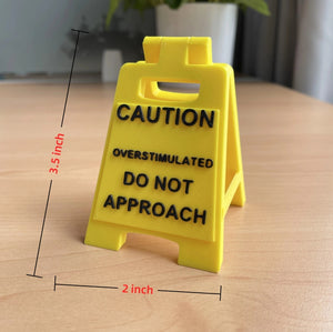 Caution Overstimulated Sign for Desk - Yellow Sign with Black Text, Warning Message for Safety Awareness